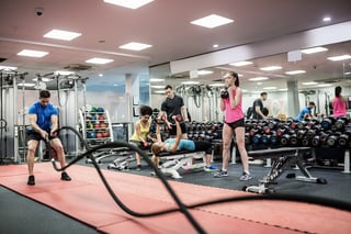 Fit-people-working-out-in-weight-room.jpg