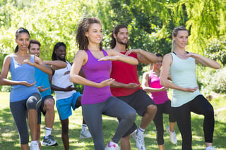 Fitness-group-doing-tai-chi-in-park.jpg