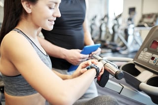 close-up-of-woman-setting-heart-rate-monitor.jpg